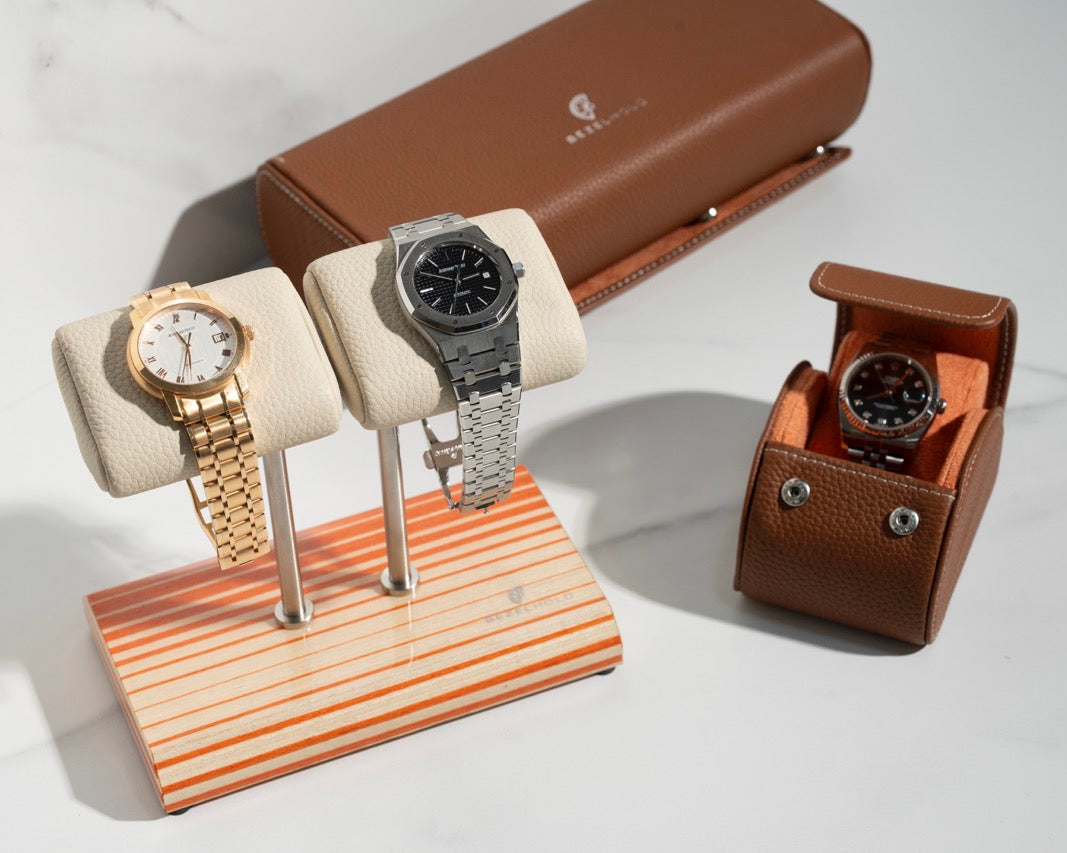 white leather and orange watch stand