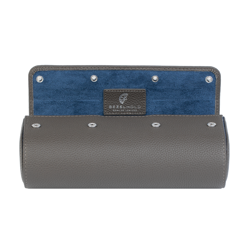 A luxury grey and blue leather watch case for travel and storage. Holds three watches.