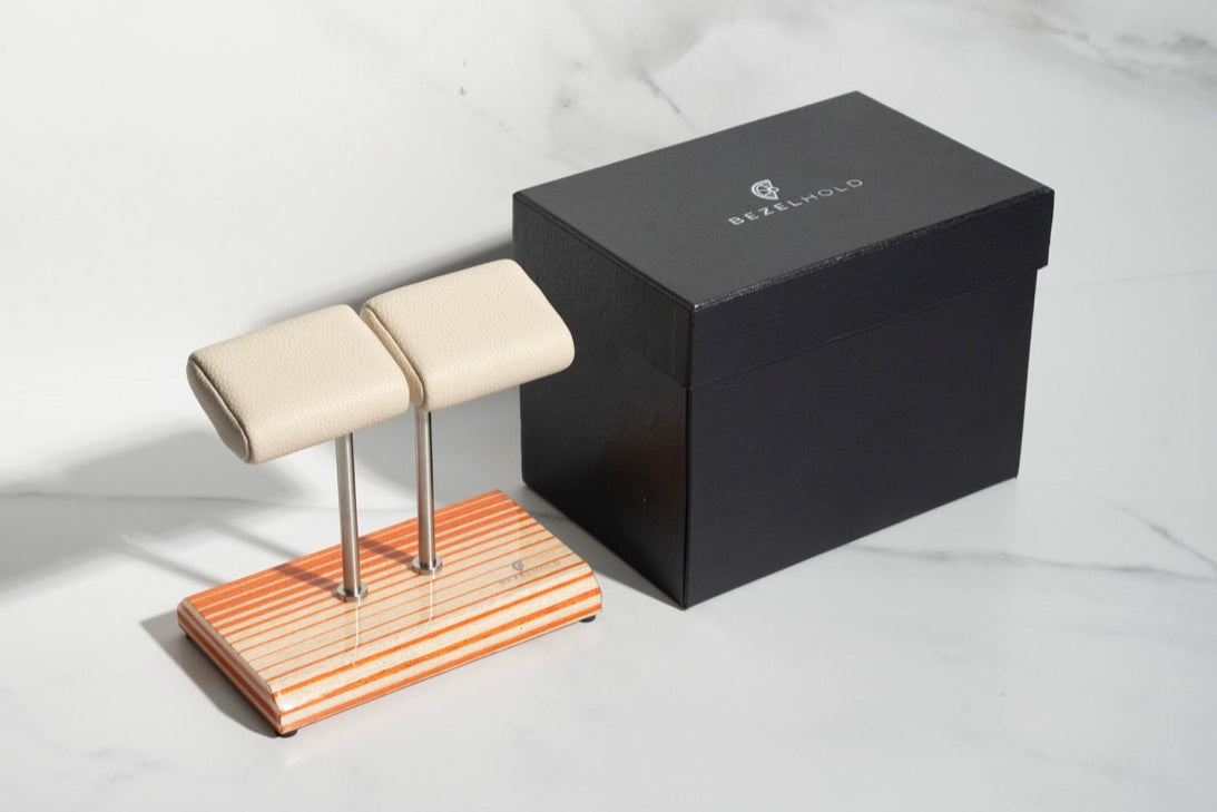 white leather and orange watch stand