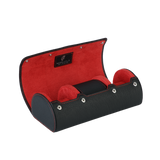 A luxury black and red leather watch case for travel and storage.