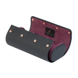 A luxury black and purple leather watch case for travel and storage. Holds three watches.