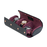 A luxury black and purple leather watch case for travel and storage. Holds three watches.
